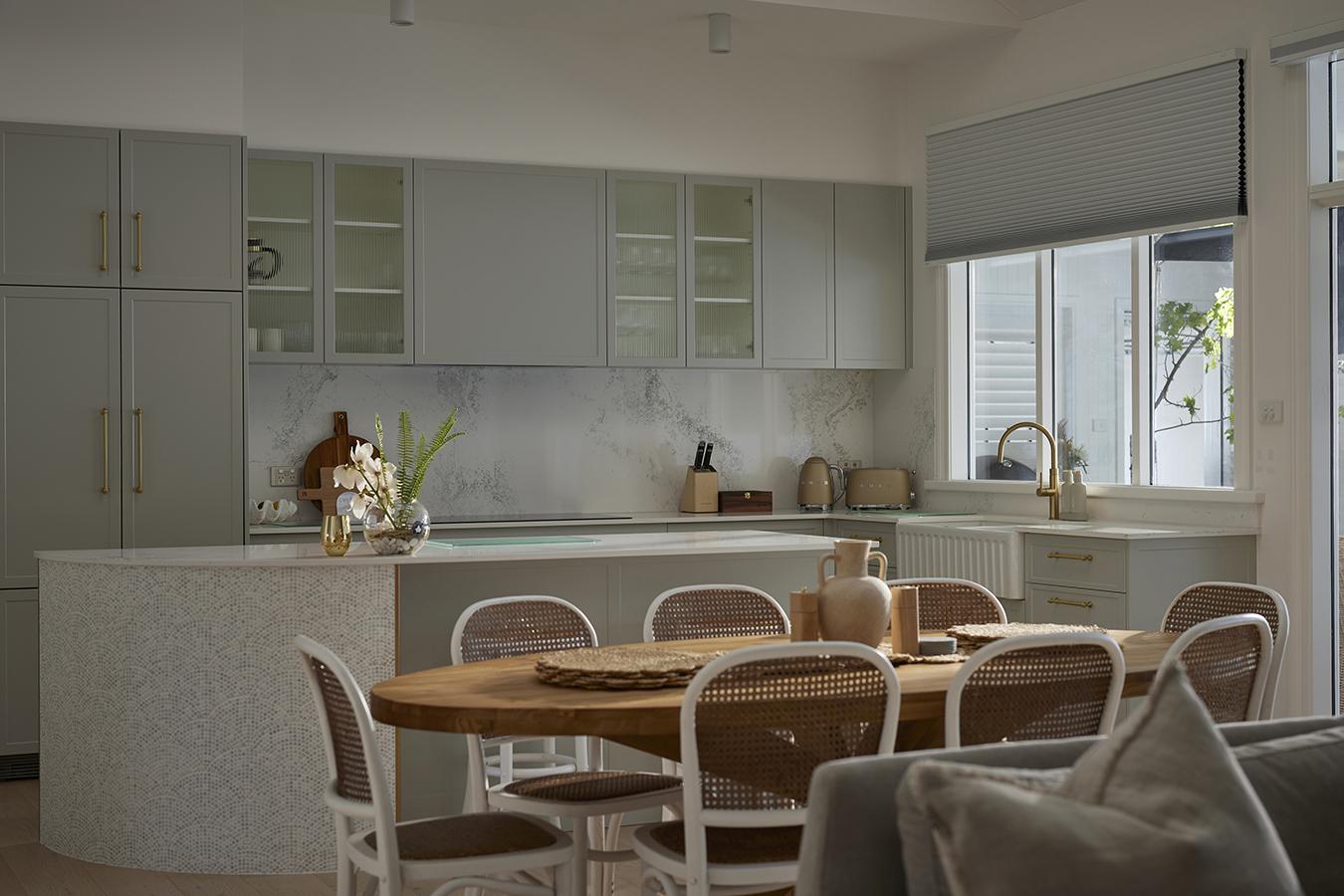 A family dining space with the shades half drawn