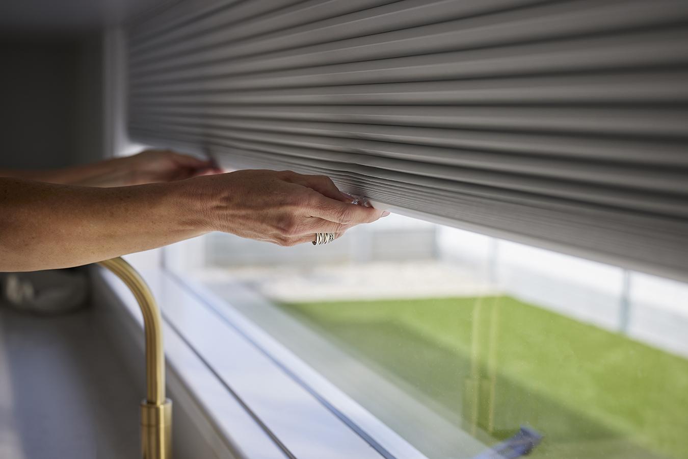 A cordless honeycomb shade, no pull cords in sight