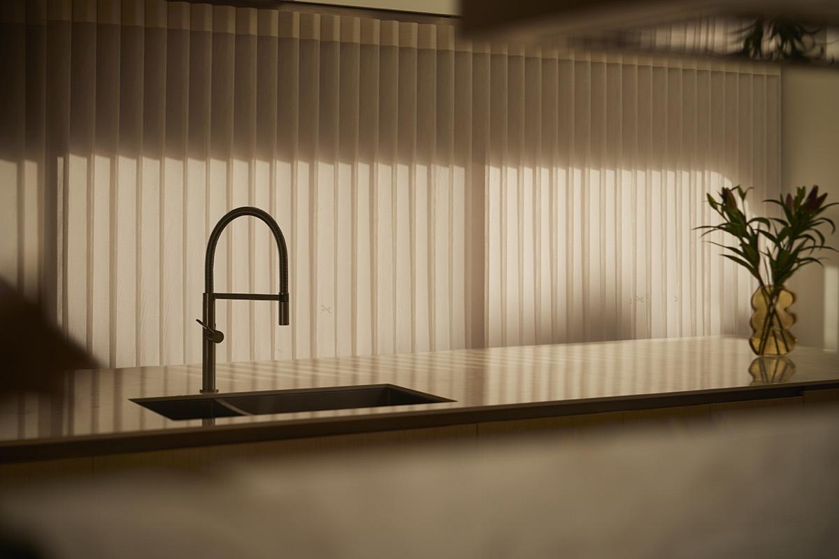 A kitchen with SmartDrape closed against the daylight.